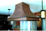 Antiqued copper kitchen hood for Skywalker Construction